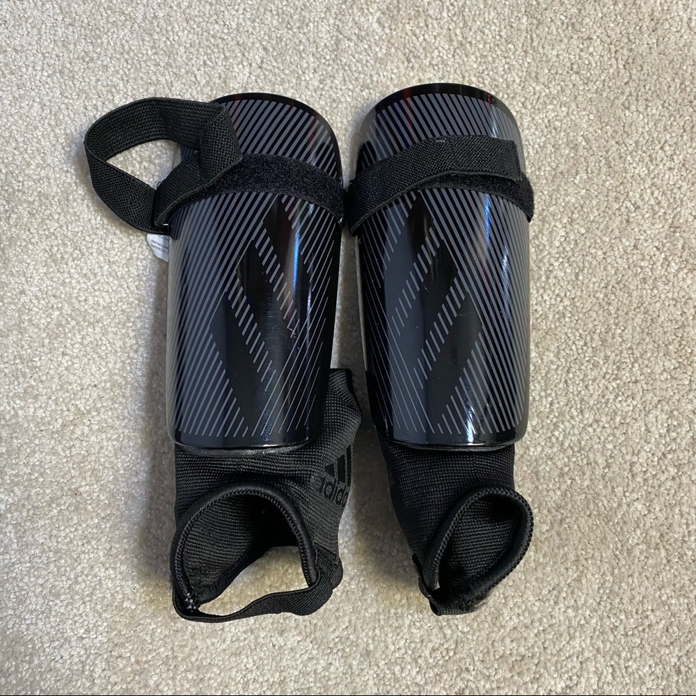 Adidas size small shinguards black